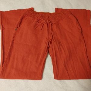 NWT orange linen flare leg pants.